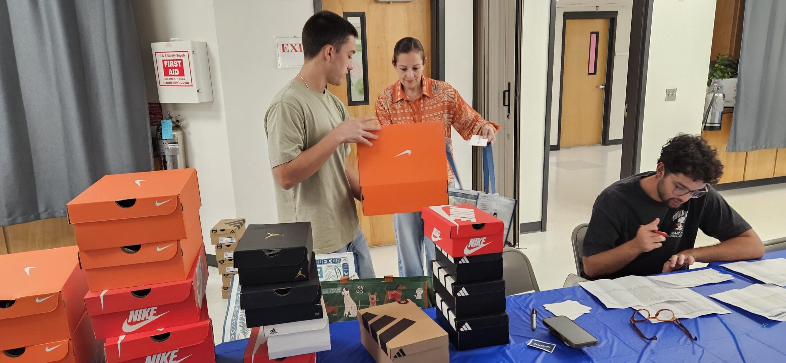 2026 Back-to-School Bash & Shoe Drive 3 | Christian's Manor Volunteers organizing shoes for Christian’s Manor children