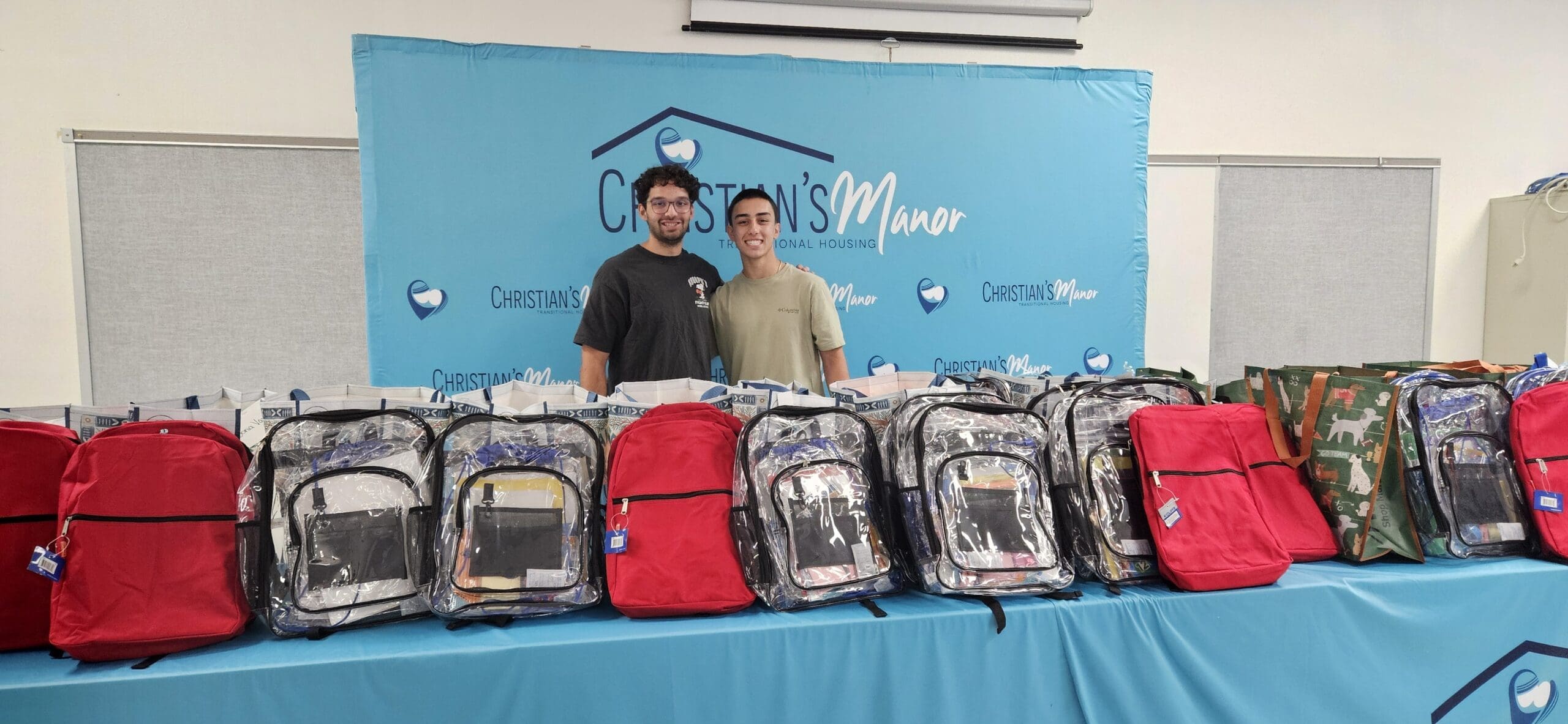 2026 Back-to-School Bash & Shoe Drive 2 | Christian's Manor Young men who organized the Christian’s Manor shoe drive and raised funds for new shoes